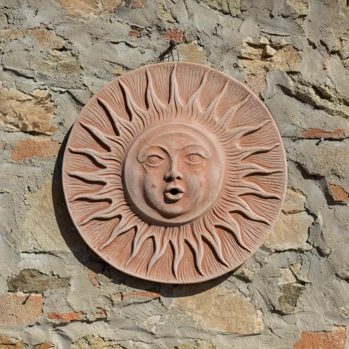 Slunce cotto ornament na zeď